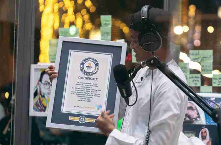 AboFlah holding his Guinness World Records certificate following his livestream tcm25 693526