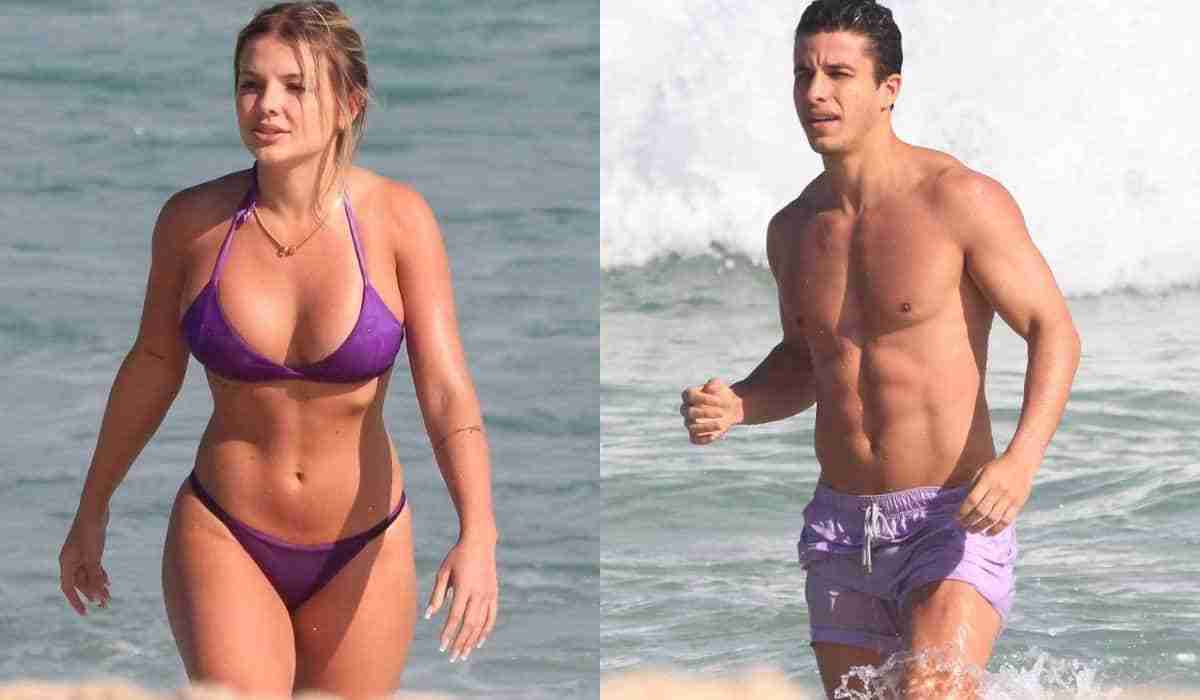 Ricky Tavares e a affair, Carol Bresolin, vão à praia com looks combinando (Foto: Fabricio Pioyani / AgNews)